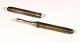 Caustic Holder